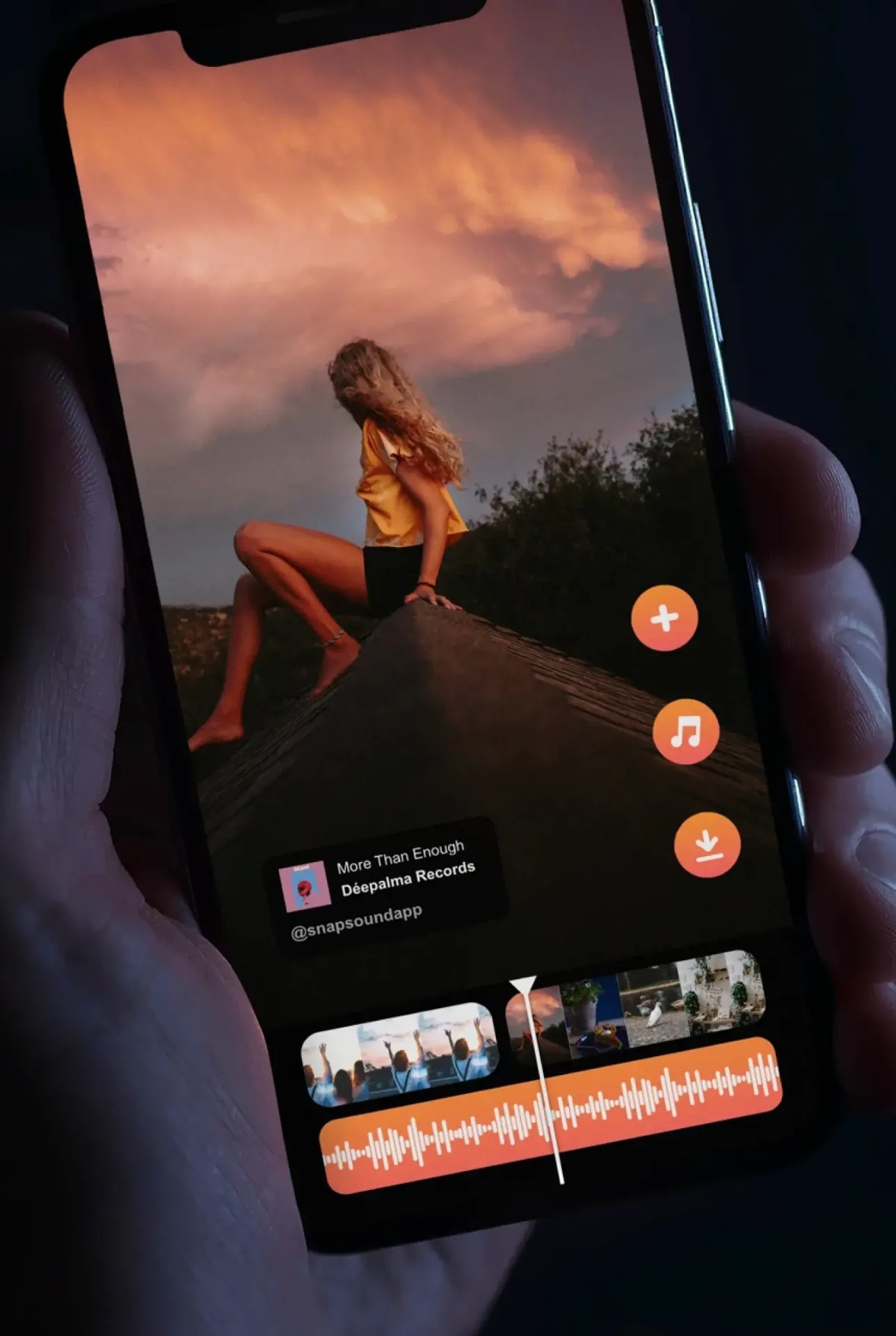 Socialmist music-video creation flow with SoundCloud-powered waveform timeline on a phone held in hand
